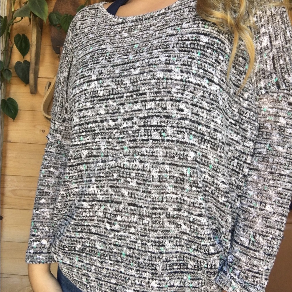 Black white and teal sweater